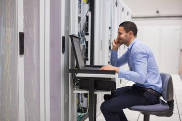 Poster - Man maintaining the servers