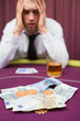© WavebreakmediaMicro - Man betting cash at poker game