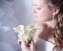 Beautiful Bride With Stylish Make-up In White Dress