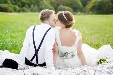 Wall Mural - Groom and Bride in a park. 