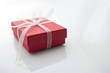 red gift box on white table