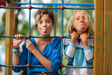 Happy Children Playing at Playground