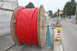 spool of cable and fiber optics in the road during the outdoor a
