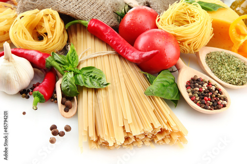 Fototapeta do kuchni Pasta spaghetti, vegetables and spices, isolated on white