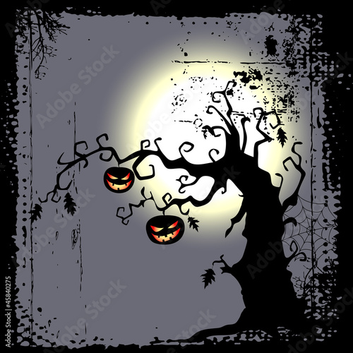 Obraz na płótnie canvas Tło halloween - dwie dynie wiszą na drzewie