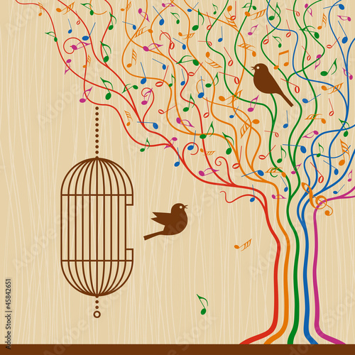 klatka-dla-ptakow-na-kolorowym-drzewie