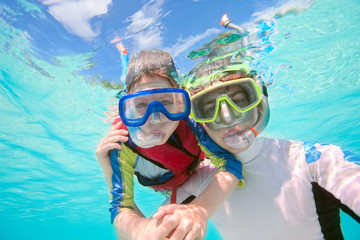 Wall Mural - Father and son snorkeling