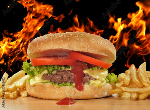 Board z aluminiowym obramowaniem Keczup kapiący hamburger.