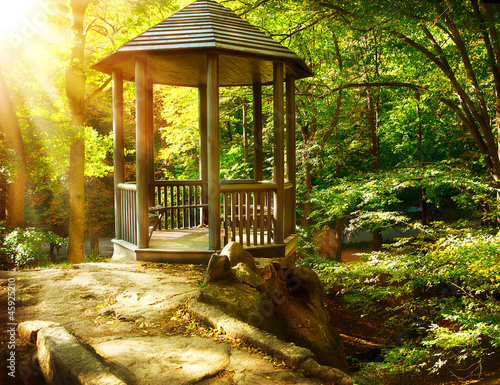 Fototapeta na wymiar Arbor in Autumnal Park. Landscaping