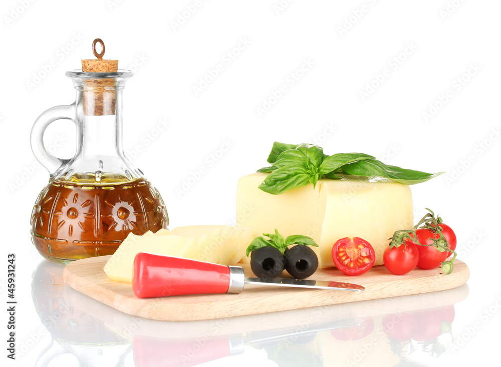 sliced mozzarella cheese with vegetables isolated on white