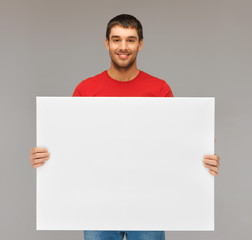 Canvas Print - handsome man with big blank board