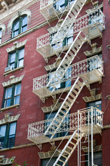 Fototapete - Escalier de secours à Greenwich Village - New York, USA