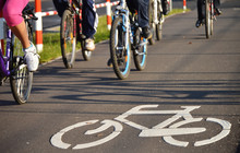 Bicycle Road Sign On Asphalt
