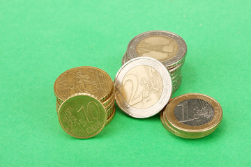 euro coins on color background