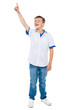 Charming young boy pointing towards copyspace area