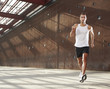 © bonninturina - young man running on the street