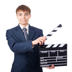 young smiling businessman with clapperboard isolated on white ba