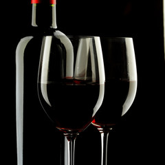 Wall Mural - Red Wine Glass silhouette Black Background