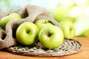 Wall Mural - Ripe green apples with leaves