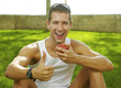 © bonninturina - sport  man showing the sign ok and eating an apple