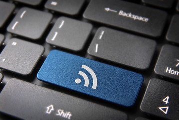 Wall Mural - blue keyboard key rss icon, internet technology background