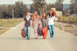 © william87 - Hippie Group Walking on a Countryside Road
