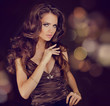 Fashion lady, sensual brunette woman with shiny curly silky hair 