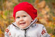 © Yarkovoy - Little cute baby girl on a background of autumn leaves