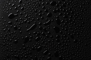 water drops on black surface