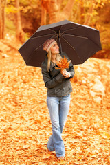 Wall Mural - Pretty woman under umbrella