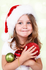 Preschool girl with Christmas decoration