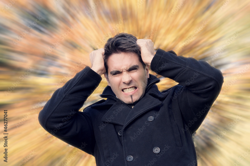 Mann raufft sich die Haare Stock Photo | Adobe Stock