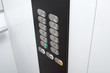Elevator black control panel with silver metal buttons