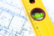 spirit level and architectural drawings