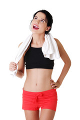 Wall Mural - Happy active woman in sports clothes