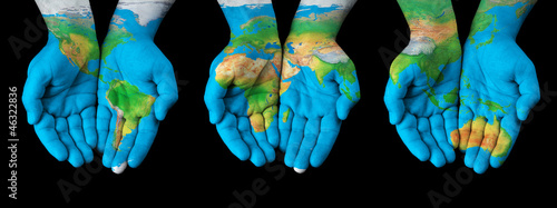 Nowoczesny obraz na płótnie Map painted on hands - concept of having the world in our hands