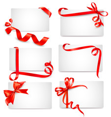 Leinwandbilder - Set of beautiful cards with red gift bows with ribbons Vector