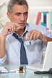 © auremar - Businessman taking his medication