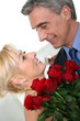 © auremar - Romantic couple with red roses