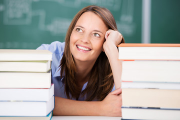 Poster - lächelnde lehrerin mit büchern