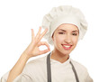 © shefkate - Attractive cook woman showing ok over white background