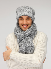 Canvas Print - handsome man in warm sweater, hat and scarf