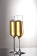 glasses of champagne on white background
