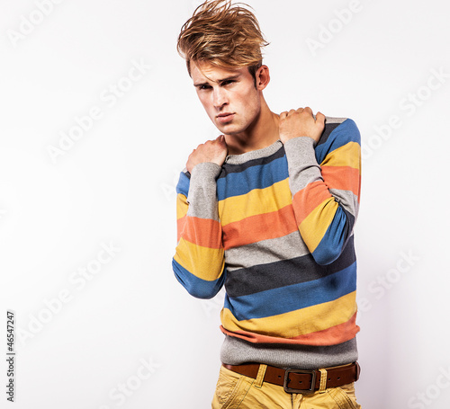 Obraz w ramie Elegant young handsome man. Studio fashion portrait.