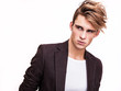 © Unique Vision - Elegant young handsome man. Studio fashion portrait.