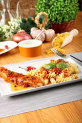 Wall Mural - Fusilli pasta with pork and tomato sauce