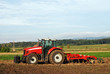 Tractor with disc harrow