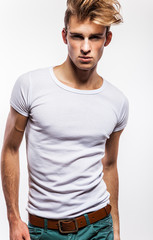 Wall Mural - Attractive man wearing T-shirt close up portrait