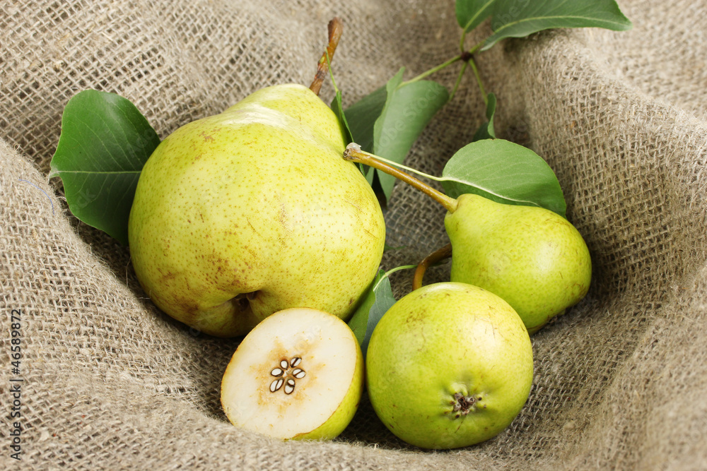 Juicy flavorful pears on sackcloth