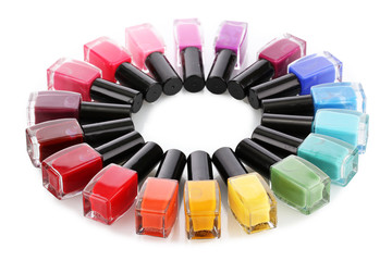 Wall Mural - Group of bright nail polishes isolated on white